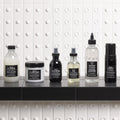 Davines OI Conditioner with the OI range on a bathroom shelf